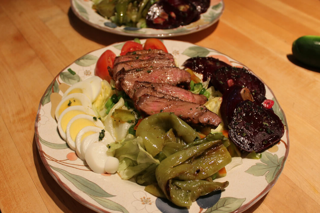 salads with steaks, beets, and peppers.
