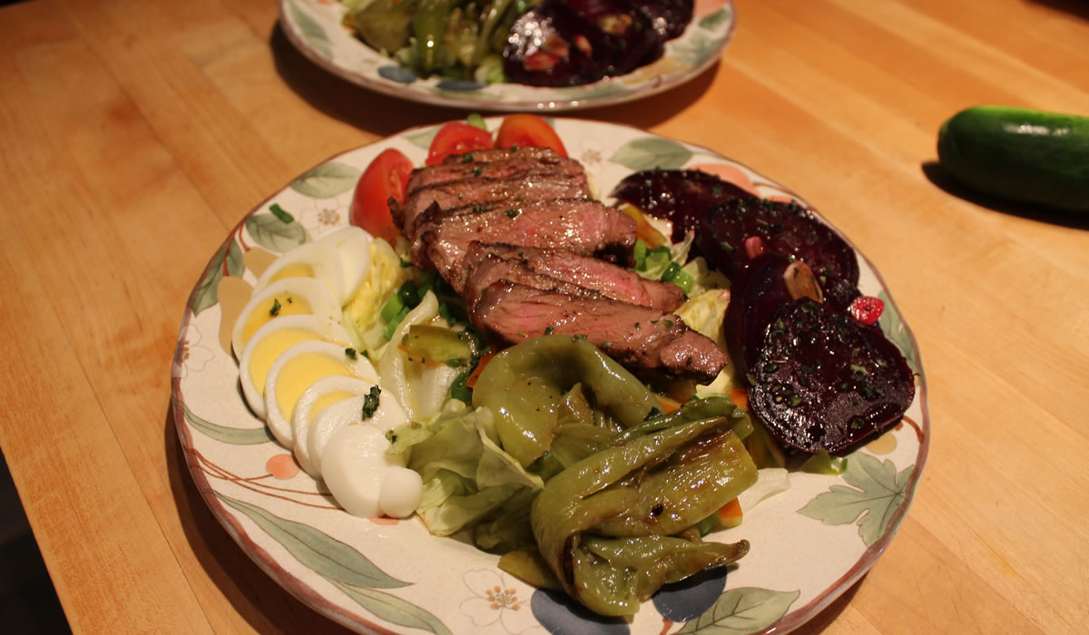salads with steaks, beets, and peppers.