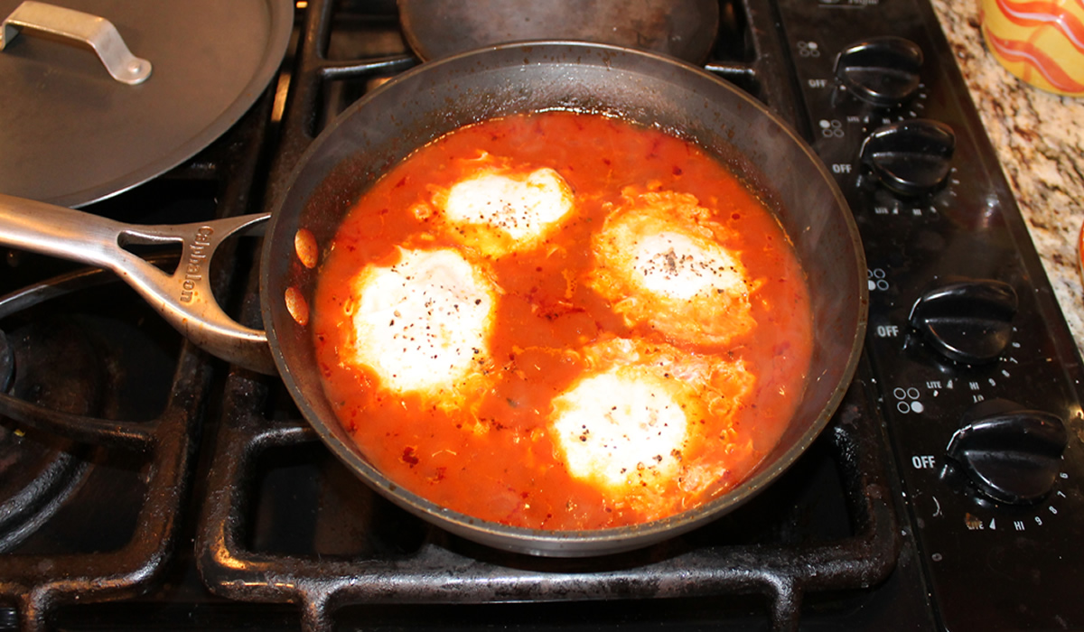 Eggs poached in tomato sauce